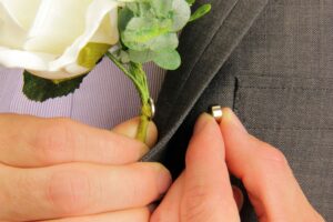 Apply your steel disk and magnet to attach a wedding corsage