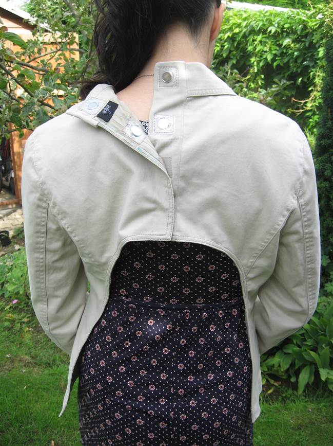 Jacket with back panel removed and split in the back with magnet fasteners