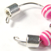 Beads charms and magnetic clasp on a memory wire ring