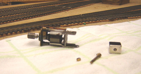 New neodymium magnet being prepared for insertion into Tri-ang/Hornby X04 motor