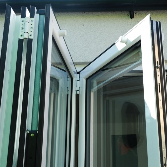 kitchen bifold doors securely opened with magnets