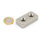 N42 Neodymium Countersunk Rectangular Magnet - 1-9/16 in. x 13/16 in. x 3/8 in. thick x 3/16 in. Hole - 53.8lbs Pull